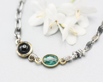 Oval Emerald  pendant bracelet with black onyx gemstone on sterling silver chain