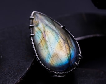 Large teardrop Labradorite ring in silver bezel and prongs setting with sterling silver skeleton multi wrap band