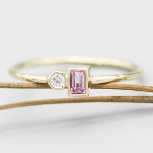 Baguette pink sapphire and diamond ring in bezel setting with 14k gold texture band