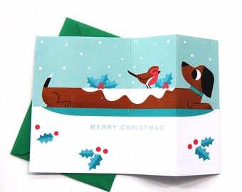 Yule Log Dog - Christmas Greetings Card - by Peski Studio