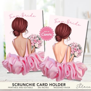 May include: Two pink scrunchies with a card holder featuring a bride illustration. The card reads "Team Bride" and "Edit in Canva". The scrunchie card holder is a wedding favor, 3x5 inches.