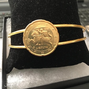 Bangle cuff bracelet made with a genuine  coin from Lithuania.  Knight on Horseback