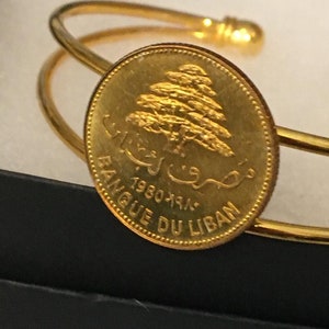 Bangle cuff bracelet made with a genuine  coin from Lebanon featuring a cedar tree