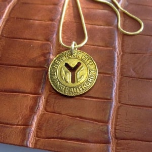 Large New York Subway token pendant