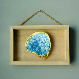 Hydrangea oyster shell in a hangable shadowbox display
