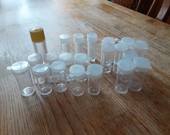 Small vials for storage of beads, mica powder or whatever.   21 bottles total.