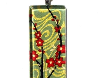 red blossoms on sage necklace pendant - glass and Japanese chiyogami - flowing cherry blossoms