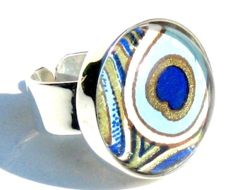 Silver Cocktail Ring. Metal and Glass Peacock Blue Feather Adjustable Ring: Peacock Feather