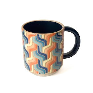 Colorful zig zag tessellated mug (blue/orange)