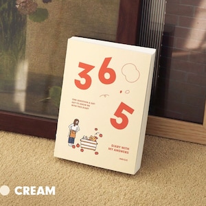 May include: A cream-colored journal with the text "365 Diary with My Answers" and "One Question a Day Get to Know Me with This Diary". The cover features a cartoon illustration of a person with a basket of apples and the numbers 365 and 5 in red.