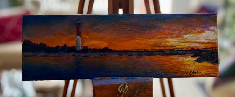 an acrylic painting of Old Barney lighthouse on Long Beach Island at sunset