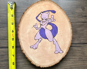 Mewtwo Pokémon wood burning, stained and hand painted with non toxic acrylic paint.