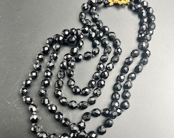 Black Faceted Glass Double Strand Knotted Necklace Gold Tone Clasp Vintage 1960s