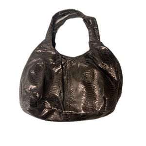 May include: A dark brown, faux snakeskin hobo bag with a single shoulder strap. The bag has a rounded shape and a textured surface, with a slight sheen. The bag is empty and sits against a white background.