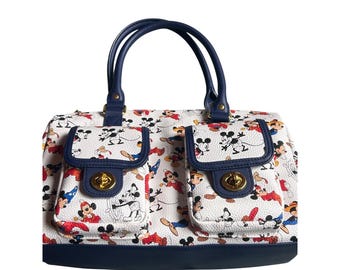 Bolso bandolera Disney Store Mickey Mouse, talla única, blanco y azul marino, excelente estado, estampado integral.