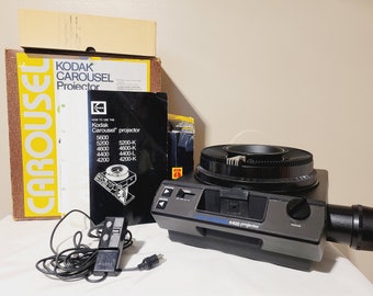 Proyector de diapositivas Kodak Carousel 4400 con caja manual y mando a distancia totalmente funcional