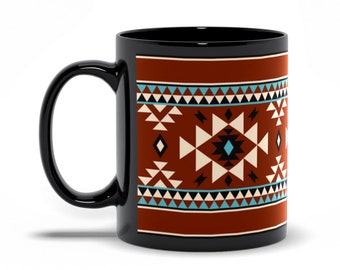 May include: Black ceramic mug with a geometric pattern in shades of red, white, blue, and black. The pattern is reminiscent of Native American art.