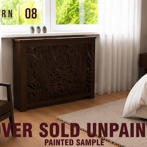 May include: A dark brown rectangular radiator cover featuring a decorative cut-out pattern of vertical wavy lines. The text PATTERN 08 is visible in the top left corner, and the text COVER SOLD UNPAINTED PAINTED SAMPLE is at the bottom.