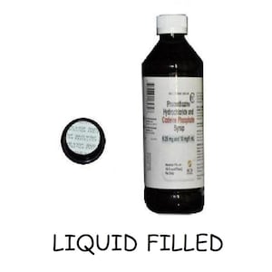 May include: A dark brown liquid-filled bottle with a white cap and a black cap next to it. The bottle has a white label with text. The text "LIQUID FILLED" is at the bottom.