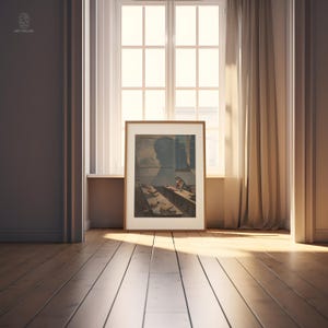 May include: A framed print of a painting depicting a person sitting at a table with several objects on it. The painting is in a light brown frame and is hanging on a wall in a room with a window and a curtain.