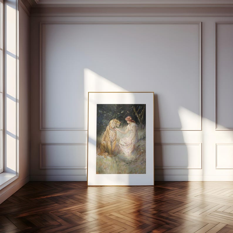 May include: A painting of a woman in a white dress sitting with a large tiger in a forest setting. The woman has red hair and is looking at the tiger. The tiger is looking at the woman. The painting is framed in gold.