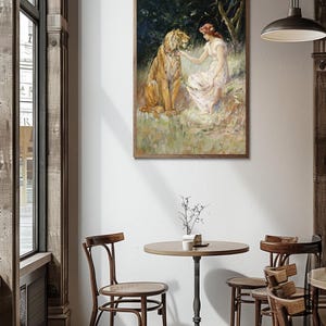 May include: A painting of a woman in a white dress interacting with a tiger in a forest setting. The woman is holding a flower and the tiger is looking at her. The painting is framed in a wooden frame.