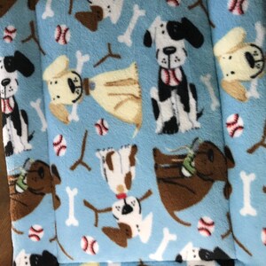 Crate Mat - Dogs Balls and Sticks on Blue - small 24 x 18