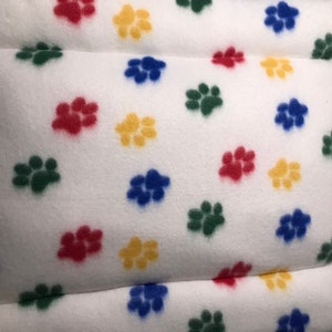 Multi Paw Prints on White Crate Pad