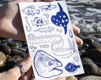 Hoja de pegatinas de peces estrellados