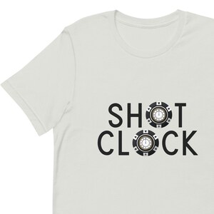 SHOT CLOCK Poker Shirt with wall clocks inside poker chips in place of the "o" in each word.