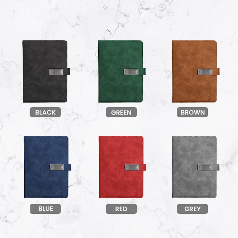 May include: Six rectangular notebooks with textured covers in black, green, brown, blue, red, and grey. Each notebook features a silver-toned metal clasp closure on the right side. Below each notebook is a label identifying its color in English.