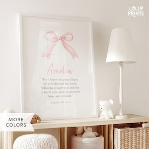 May include: A pink watercolor bow with the name Amelia and a Bible verse from Jeremiah 29:11, "For I know the plans I have for you" declares the Lord. "plans to prosper you and not to harm you, plans to give you hope and a future."