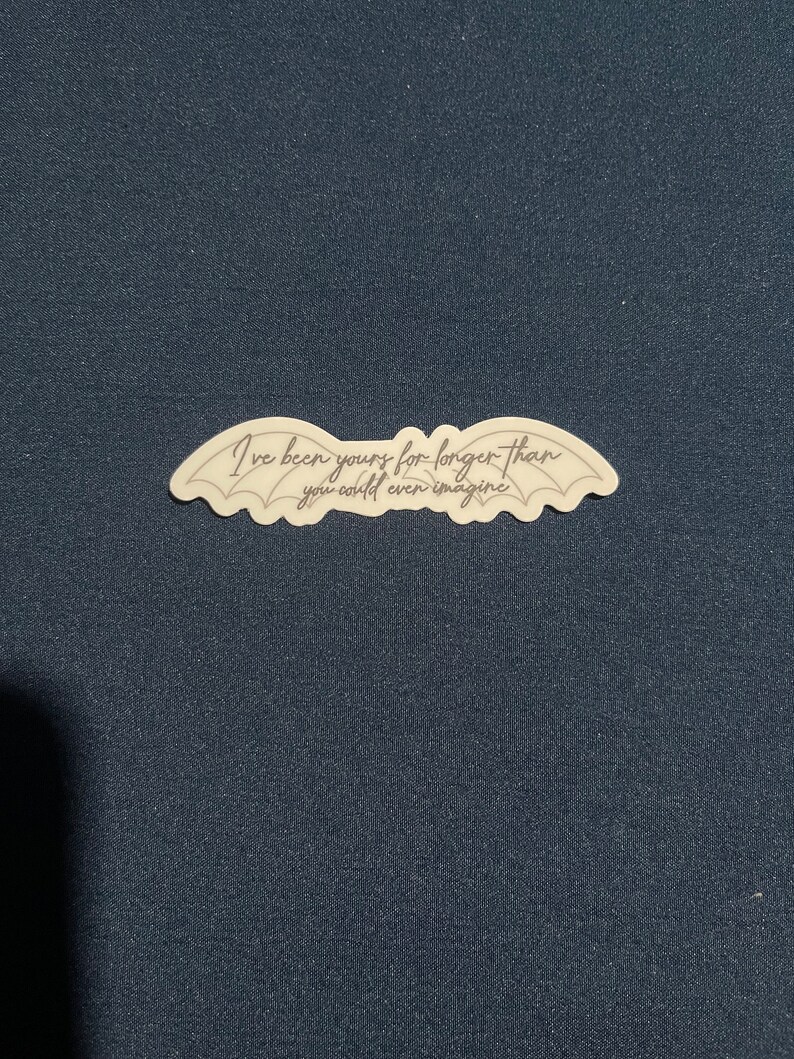 May include: A sticker with a pair of wings and the text "I've been yours for longer than you could even imagine."