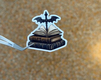 fourth wing sticker | book stack | fantasy sticker from popular booktok book fourth wing with dragons and books