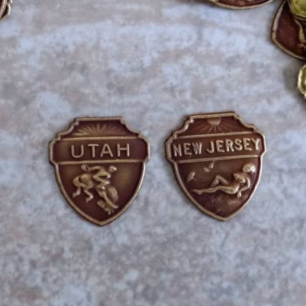 30pcs Vintage Brass Findings :NEW JERSEY or UTAH Souvenir Shield Antiqued Brass Stampings - Flat Backs, sunbathing beach scene, rodeo