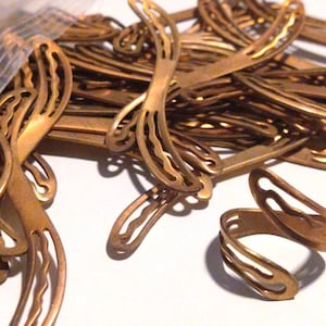 6pc Vintage Raw Brass Findings / new old stock / flat wrap ring bases