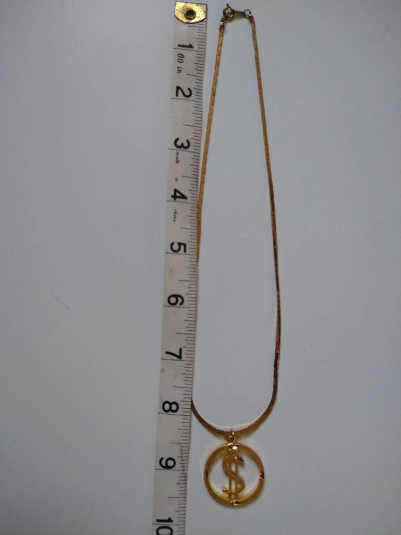 1970s DOLLAR Sign Medallion Vintage Necklace / Gold Tone / Costume