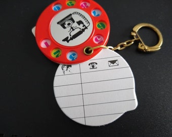 1pc 1980s Vintage Red Rotary Telephone Book Keychain / phone index / new old stock nos / plastic key chain