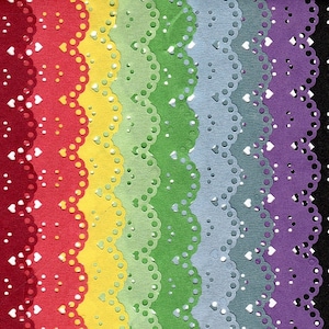 May include: A set of ten colorful lace trims with scalloped edges and heart-shaped cutouts. The trims are arranged in a rainbow pattern, starting with red and ending with black.