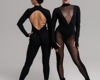 May include: Two black jumpsuits. One features a keyhole back and long sleeves. The other has a sheer neckline and panels on the legs. Both outfits are paired with black heeled boots. The background is a plain, light gray.