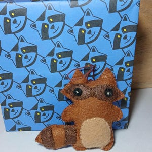 Felt raccoon ornament