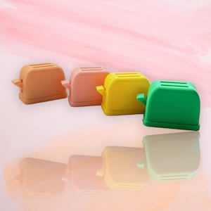 Mini toaster switch game holder