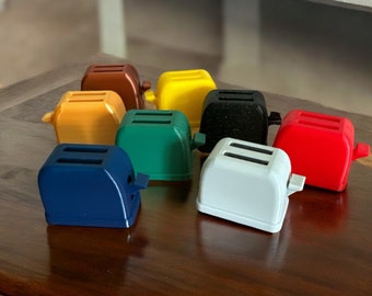 Mini toaster switch game holder
