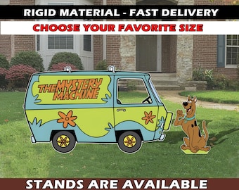 May include: A blue and green cartoon van with the words "The Mystery Machine" on the side. A brown cartoon dog stands next to the van. The van and dog are cutouts, likely made of rigid material. The text "Rigid Material - Fast Delivery" and "Choose Your Favorite Size" is at the top of the image. The text "Stands Are Available" is at the bottom of the image.
