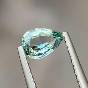 Teal Sapphire Pear Cut Gemstone: 0.78 ct Untreated Blue-Green Stone
