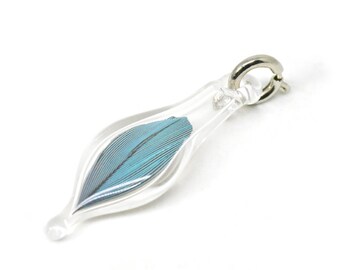 Blown Glass Capsule Charm with Cruelty Free Blue Parrot Feather Inside
