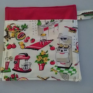 May include: A red and white kitchen-themed fabric pot holder with a red handle. The fabric features a vintage design with a kitchen stove, mixer, and other kitchen items.