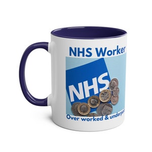 May include: White ceramic mug with a navy blue interior and handle. The mug features the NHS logo and the words "NHS Worker" and "Over worked & underpaid" with a pile of coins.