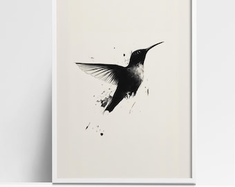 May include: A black and white illustration of a hummingbird in flight with splattered ink accents.
