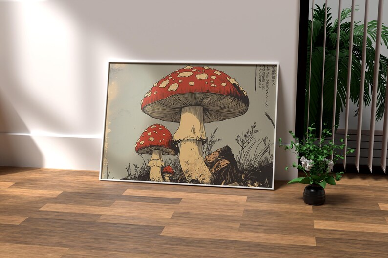 Japanese woodcut-style art print of red Amanita mushrooms with vintage botanical detailing. Perfect for nature and mushroom art lovers.